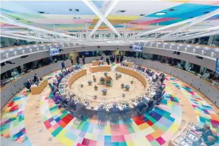  ?? — AFP ?? A general view of European Union leaders attending the second day of a EU summit at the European Council in Brussels on Thursday.