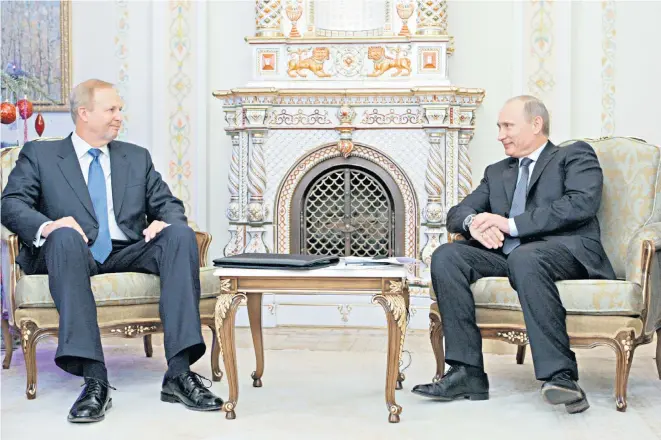  ??  ?? BP chief executive Bob Dudley, left, with Vladimir Putin, the then prime minister of Russia, during a meeting in 2011