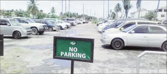  ??  ?? Cars parked at the GRA parking lot at Camp and Lamaha streets.