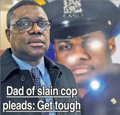  ??  ?? FIGHT ON: Detective Randolph Holder’s father, Randolph Sr., at a Manhattan rally for gun-crime reform on Monday.