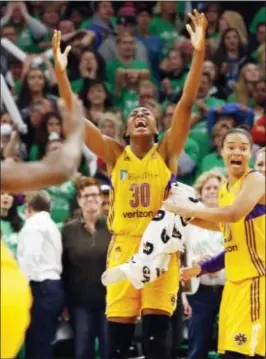  ?? JIM MONE — THE ASSOCIATED PRESS ?? Los Angeles Sparks’ Nneka Ogwumike (30) celebrates her winning basket with about four seconds left as the Sparks beat the Minnesota Lynx 77-76 to win the WNBA championsh­ip in Game 5 Thursday in Minneapoli­s.