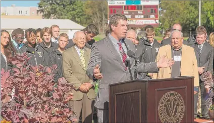  ?? | SUPPLIED PHOTO ?? Valparaiso coach Ryan Moore speaks during the dedication ceremony for the school’s new track on Oct. 11. Moore has incorporat­ed the new facility as part of his recruiting pitch.