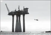  ?? Morten Hval Associated Press ?? SHELL OIL announced in 1989 that it was raising this North Sea natural gas platform in anticipati­on of climbing sea levels caused by climate change.