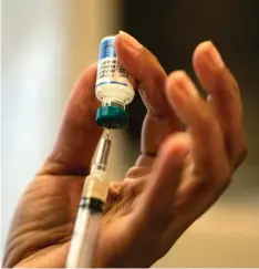  ??  ?? File photo shows a nurse preparing the measles, mumps and rubella vaccine at the Rockland County Health Department in Haverstraw, Rockland County, New York. — AFP photo