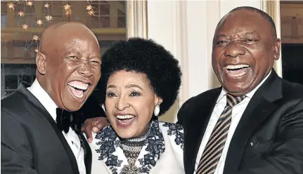  ?? / ELMOND JIYANE/ GCIS ?? Winnie Madikizela-Mandela flanked by EFF leader Julius Malema and President Cyril Ramaphosa at her 80th birthday celebratio­n.