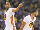  ?? Santiago Mejia / The Chronicle ?? Andre Iguodala (left) tweeted that he’ll be returning; Stephen Curry (right) agreed to a five-year, $201 million deal Friday evening.