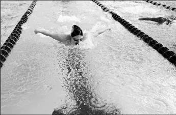  ??  ?? Lake Central’s Maggie DePirro swims the 100-yard butterfly