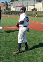  ?? COURTESY MARQUES INMAN ?? Marques Inman of the D.C. Grays warms up before a game.