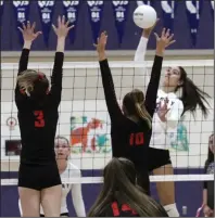  ?? MIKE BUSH/NEWS-SENTINEL ?? Tokay outside hitter Kayly Pau (9) sends the volleyball over the