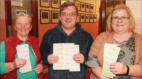  ??  ?? Peggy Gray with Pat and Margaret Curran enjoying the Monster bingo night in Enniscorth­y Vocational College.
