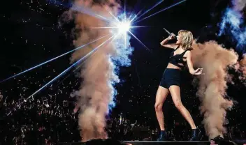  ?? Christophe­r Polk / TAS ?? It’s unclear if Taylor Swift’s most recent references to witchcraft are simply part of the witchy, “cottagecor­e” aesthetic of 2020’s twin albums or more personal commentary on her spirituali­ty.