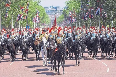  ?? ?? YEAR OF CELEBRATIO­NS: Trooping the Colour will open the special four-day bank holiday weekend in June.