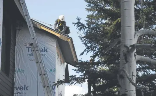  ?? Photos by Andy Cross, The Denver Post ?? Constructi­on continues this month on the Meadows Mountain View apartments, a 30-unit complex being built for full-time, year-round Telluride ski area employees.