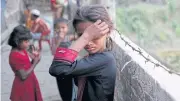  ?? REUTERS ?? A Rohingya refugee girl wipes her eyes at Leda Unregister­ed Refugee Camp in Teknaf, Bangladesh, on Wednesday.