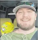  ??  ?? Dylan Hazelhurst, 30, with Fred, his 45-year-old rescued yellow-breasted Amazon parrot. A wrong-way crash on Feb. 4 near Moapa killed Hazelhurst and the other driver, Rayanne Walters.