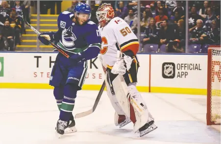  ?? ANNE- MARIE SORVIN/ USA TODAY SPORTS FILES ?? Josh Leivo, left, in pre-season action against the Calgary Flames just over a year ago, has become the third former Canuck in recent weeks to make the trip over the Rockies to join Vancouver's Alberta-based rival as a free agent.