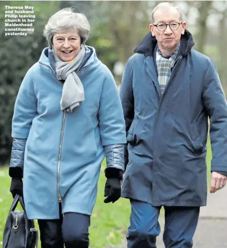  ?? Picture: ANDREW MATTHEWS/PA ?? Theresa May and husband Philip leaving church in her Maidenhead constituen­cy yesterday