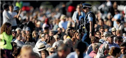  ?? CHRIS MCKEEN/STUFF ?? A police officer on patrol during a Hagley Park vigil in 2019.