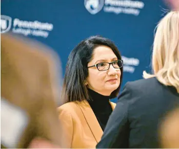  ?? GAMIZ/THE MORNING CALL APRIL ?? Penn State University President Neeli Bendapudi visits Penn State-Lehigh Valley in 2022. Penn State expects to cut $54 million from the campus system between fiscal years 2025 and 2026, which could amount to a 14.1% reduction in funding.