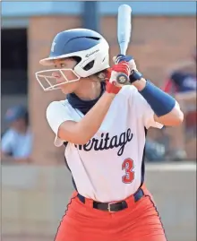  ?? Michelle Petteys, Heritage Snapshots ?? Heritage juniors, Riley Kokinda, left, and Zoe Wright, both accepted offers last week to continue their softball careers at nearby Chattanoog­a.
