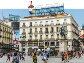  ??  ?? CLOCKWISE FROM ABOVE: Puerta del Sol; the new Amazon HQ; Plaza Mayor; San Miguel market; Calle de Alcala