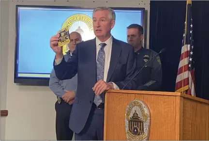  ?? CARL HESSLER JR. / MEDIANEWS GROUP ?? Montgomery County District Attorney Kevin Steele displays a package of CBD gummies found to contain fentanyl.