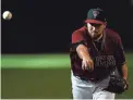  ?? JOE CAMPOREALE/USA TODAY SPORTS ?? Diamondbac­ks closer Stefan Crichton delivers against the Rockies during the eighth inning Sunday in Phoenix.