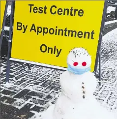  ??  ?? A Covid test centre snowman at Eurogate