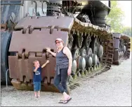  ?? Randy Moll/Westside Eagle Observer ?? The enormity of Big Brutus, an electric shovel in West Mineral, Kan., can be seen by its tracks behind my wife and grandson.