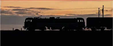  ?? John Hales ?? The classic lines of Locomotive Services Group’s 86101 Sir William A Stanier FRS are silhouette­d as the locomotive heads south at Bay Horse with the Carlisle to London Euston leg of Steam Dreams’ ‘Settle and Carlisle Railway’ charter on March 25.