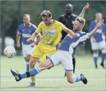  ??  ?? HOPING FOR ‘JUSTICE’
Denmead (blue) in action against Clanfield in a pre-season friendly