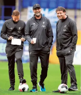  ?? REUTERS ?? Holy trinity: (From left) Pepijn Lijnders, Jurgen Klopp and Peter Krawietz.