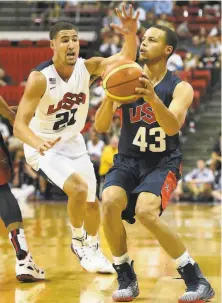  ?? Ethan Miller / Getty Images 2014 ?? Klay Thompson guards Stephen Curry at a Team USA showcase in Las Vegas in 2014, before the Warriors’ title run began.