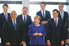  ?? Reuters ?? Italian PM Giuseppe Conte, Bulgarian PM Boyko Borisov, Maltese PM Joseph Muscat, German Chancellor Angela Merkel, Austrian Chancellor Sebastian Kurz, Spanish PM Pedro Sanchez and Finnish PM Juha Sipila at the start of the emergency EU summit in Brussels, yesterday.