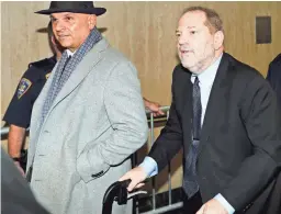  ??  ?? Harvey Weinstein, right, leaves his rape trial Tuesday in New York. The “evidence portion” of the trial concluded Tuesday.