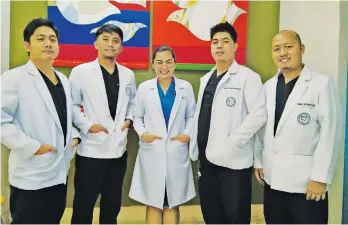  ??  ?? UPGRADING. Hospital dentistry and oral surgery trainees from left Dr. Ross James Corvera, Dr. Gino Arvin Santos, Dr. Emaryl Julian, Dr. Andrew Louis Lamela, and Dr. Primo Betanio.