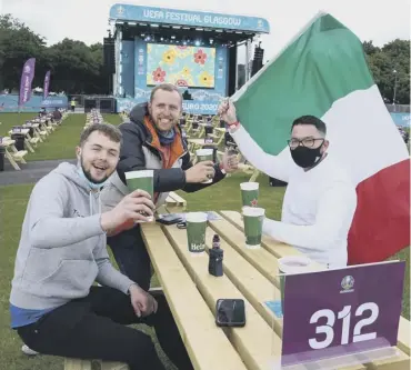  ??  ?? Italy fans show their support at Glasgow Green