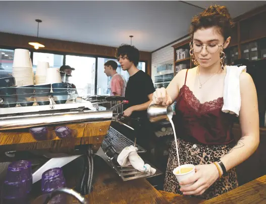  ?? PHOTOS: ALLEN MCINNIS ?? Skye James makes a latte at the Mackay St. location of Myriade, one of seven Montreal spots serving excellent brownies.