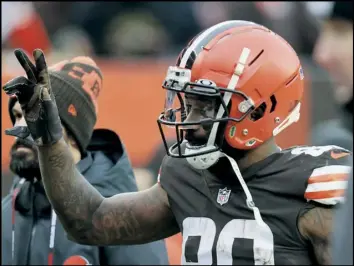  ?? Tribune News Service ?? Wide receiver Jarvis Landry waves to Browns fans as he exits the field after Cleveland’s win over the Cincinnati Bengals on Sunday Jan, 9, at Firstenerg­y Stadium.