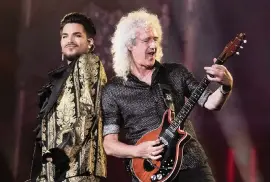  ?? CHARLES SYKES Invision/AP file ?? Adam Lambert, left, and Brian May, right, of Queen, and bandmate Roger Taylor gathered virtually to record a new version of the Queen classic, ‘We Are the Champions.’
Zayn Malik and Gigi Hadid.