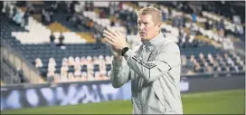  ?? SUBMITTED PHOTO - COURTESY OF PHILADELPH­IA UNION ?? Union manager Jim Curtin salutes the fans after a 2-1 win over Montreal on Oct. 11 at Subaru Park. He was disappoint­ed to learn of the decision to cancel the Supporters’ Shield