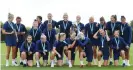  ?? Photograph: Harriet Lander/Chelsea FC/Getty Images ?? The Chelsea players pose with the Barclays FA Women’s Super League trophy and their winners medals ahead of a training session in August.