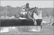  ?? Doug Walker, File ?? In this April 2016 file photo, Devil’s Wrangler, with Mark Watts in the saddle, was an easy winner in the first of five races at the Atlanta Steeplecha­se at Kingston Downs.