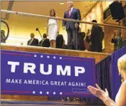  ?? Richard Drew Associated Press ?? DONALD AND Melania Trump, pictured in New York in 2015, are applauded by his daughter Ivanka, right, as he prepares to announce his presidenti­al bid.