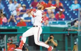  ?? Rob Carr Getty Images ?? BRYCE HARPER batted .249 last season with the Washington Nationals but hit 34 home runs, drove in a career-high 100 runs and led the majors with 130 walks.