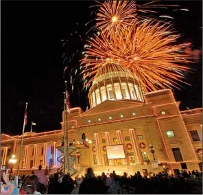  ?? Democrat-Gazette file photo ?? The Arkansas Capitol lighting ceremony finishes with fireworks after The Big Jingle Jubilee Holiday Parade in Little Rock on Saturday.