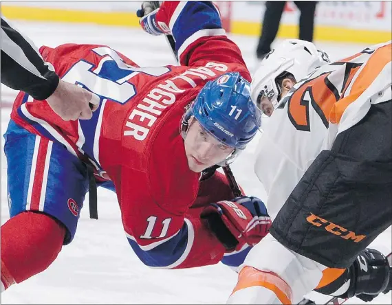  ?? — GETTY IMAGES FILES ?? Brendan Gallagher of the Montreal Canadiens, a Vancouver Giant for four seasons of junior hockey, faces off against Philadelph­ia’s Maxime Talbot last week. The Habs play the Canucks at Rogers Arena Saturday night, Gallagher’s first NHL game in Vancouver.