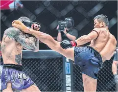  ?? ?? Nong-O Gaiyanghad­ao, right, kicks Liam Harrison during their fight in August.