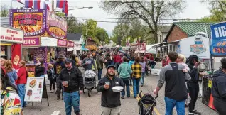  ?? TOM GILLIAM / CONTRIBUTI­NG PHOTOGRAPH­ER ?? The 44th annual Bellbrook Sugar Maple Festival will be held this weekend.
Marco Giacona (Tony) and Stephanie Garcia (Maria) in La Comedia Dinner Theatre’s production of “West Side Story.”