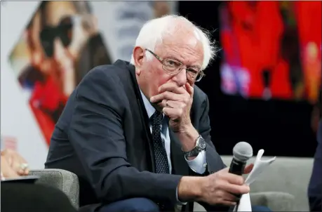  ?? CHARLIE NEIBERGALL — THE ASSOCIATED PRESS ?? Democratic presidenti­al candidate Sen. Bernie Sanders listens to a question for the audience during the Presidenti­al Gun Sense Forum, Saturday in Des Moines, Iowa.